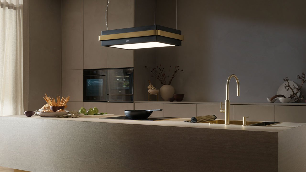 Kitchen island with a suspended hood turned on
