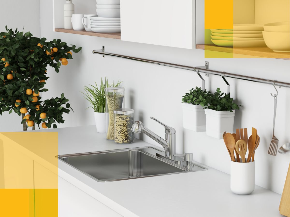 Bright white kitchen with a single bowl kitchen sink, and a pull out kitchen faucet 