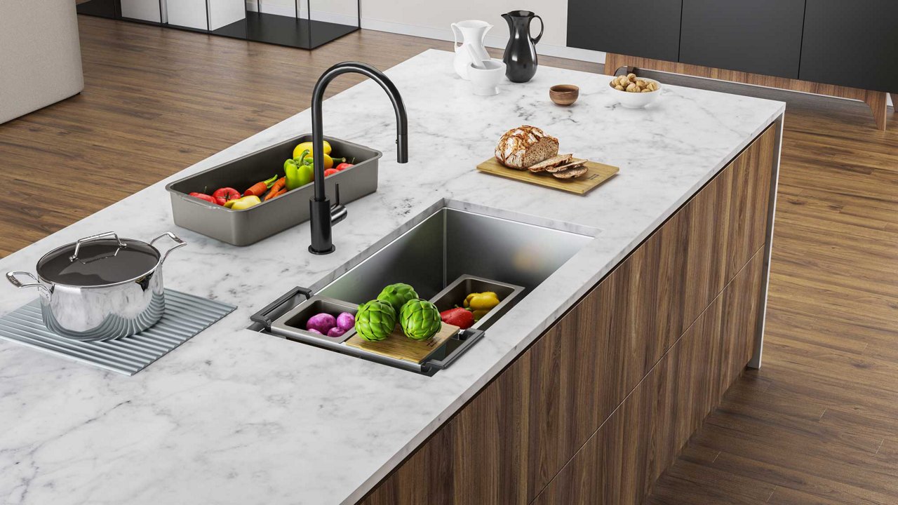 Large kitchen island with a Franke Cube Workcenter kitchen sink and All-In sink accessory kit paired with a cube faucet