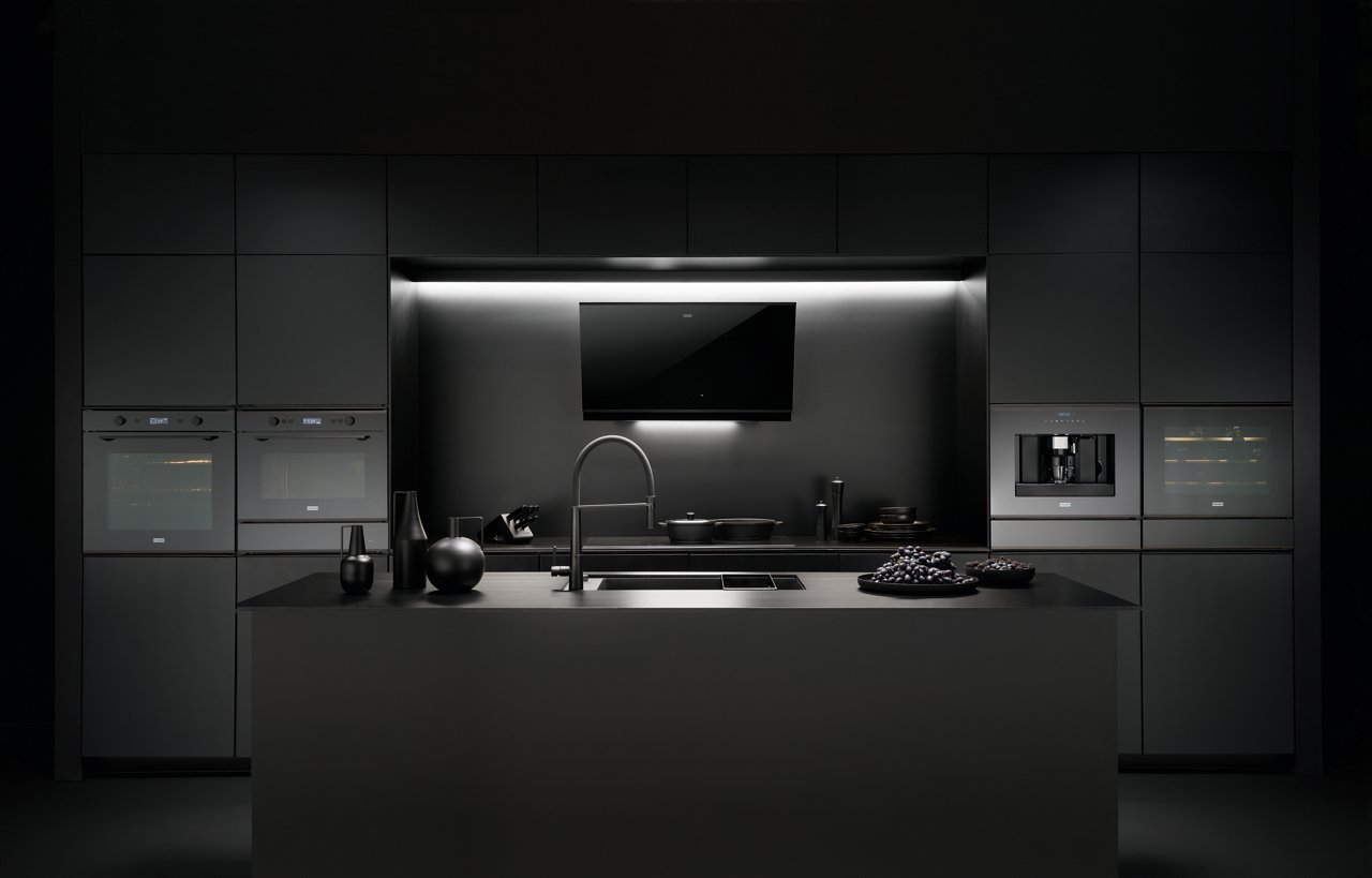 The Mythos Black Line Steam Oven in chic black glass is perfect for creating a sophisticated and harmonious kitchen aesthetic.