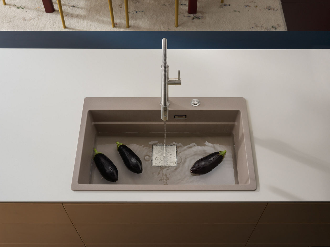 Modern Franke Kubus Pro beige kitchen sink with functional ledge