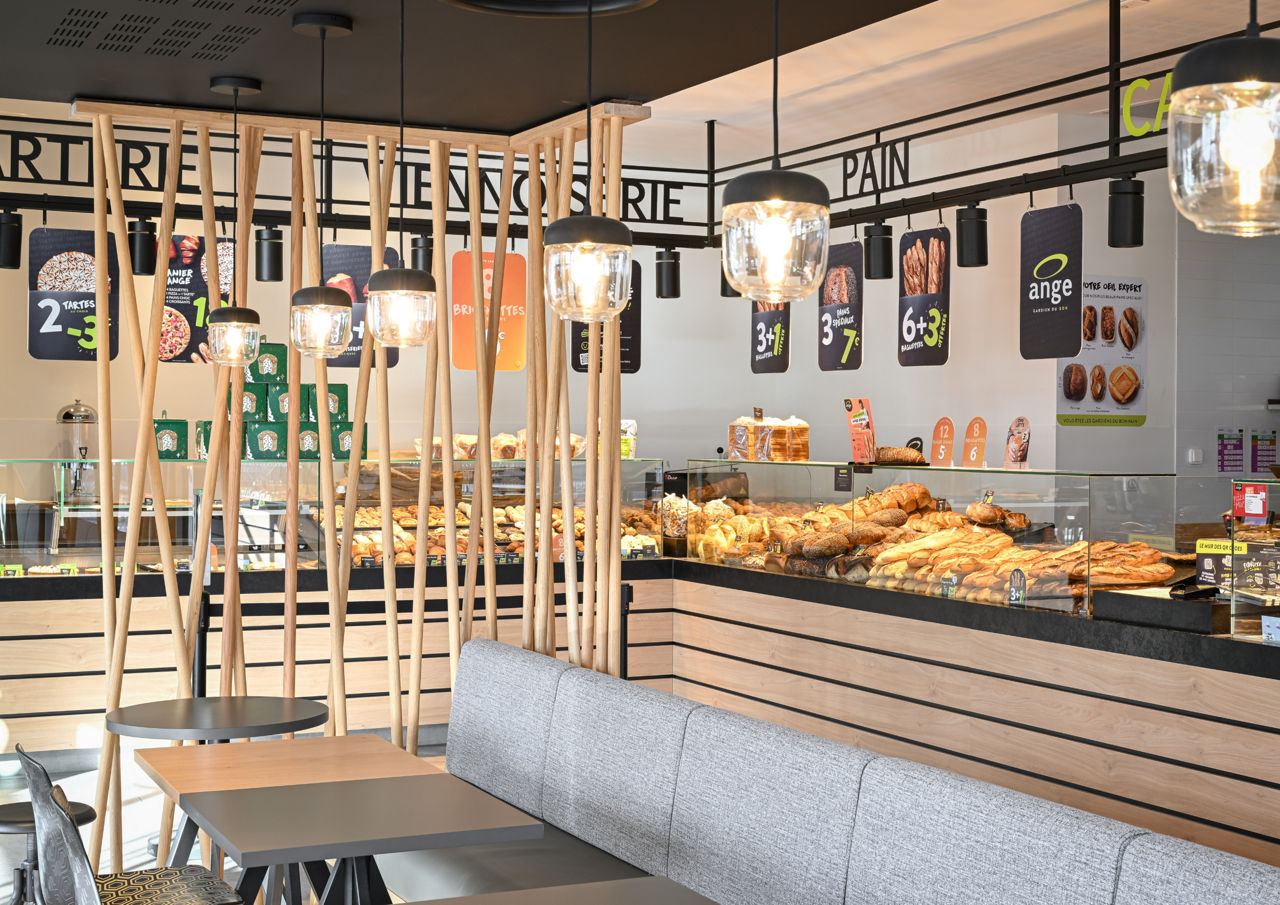Franke Coffee Systems, Boulangerie Ange inside view, counter with pastry, sitting area