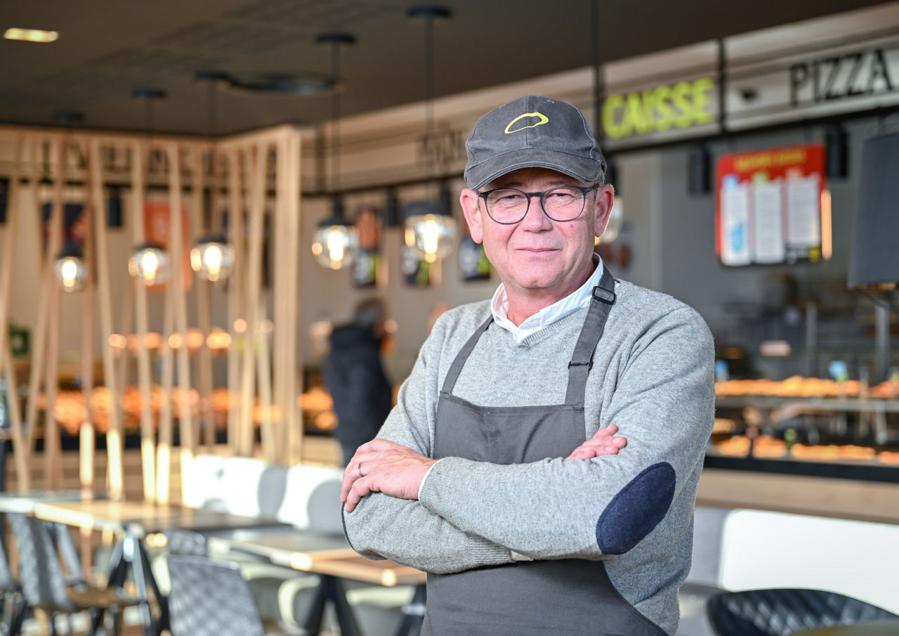 Franke Coffee Systems, Boulangerie Ange, man standing, franchisee portrait, Nicolas Damery with branded hat