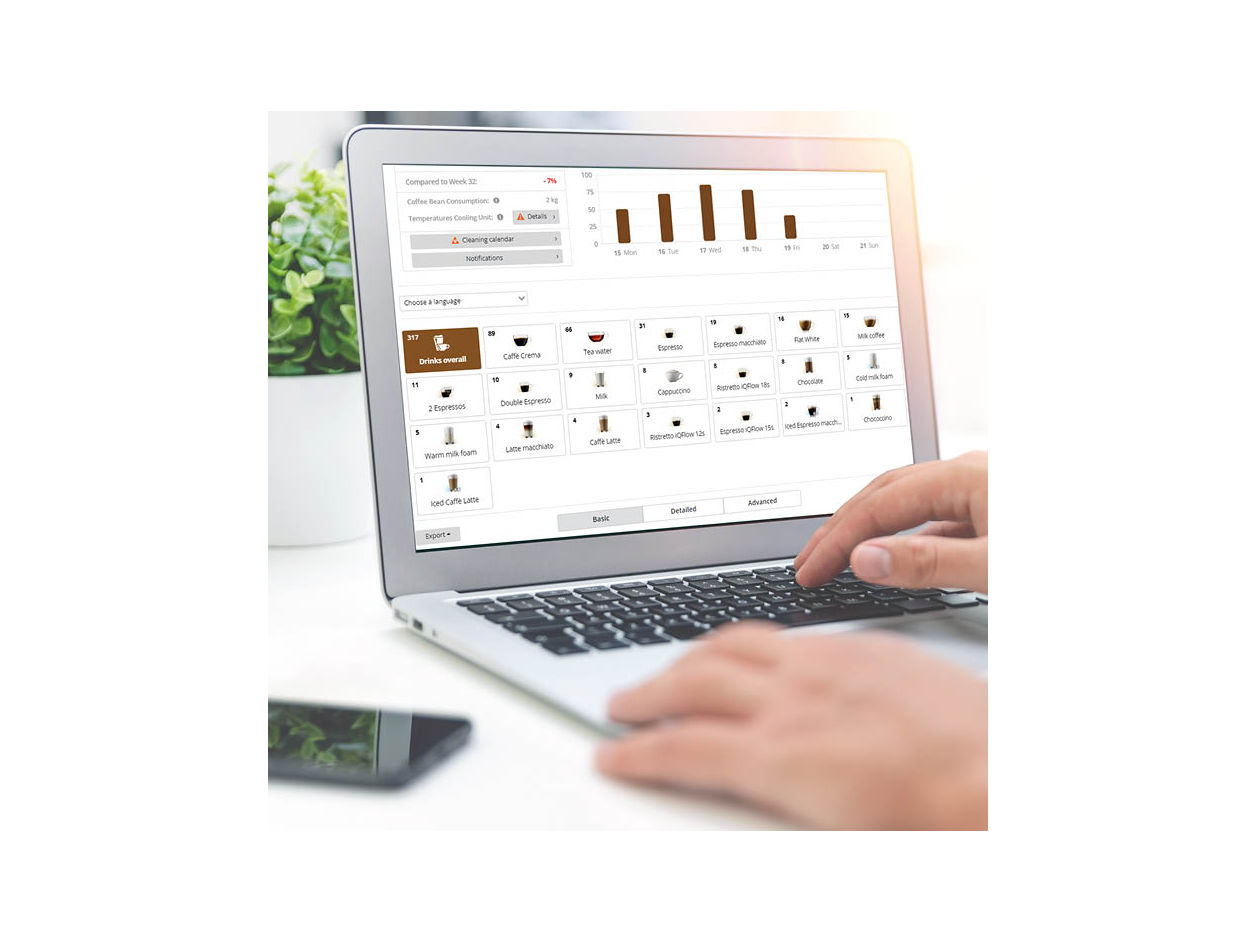 Franke Coffee Systems Franke Digital Services close-up on Laptop, hands
