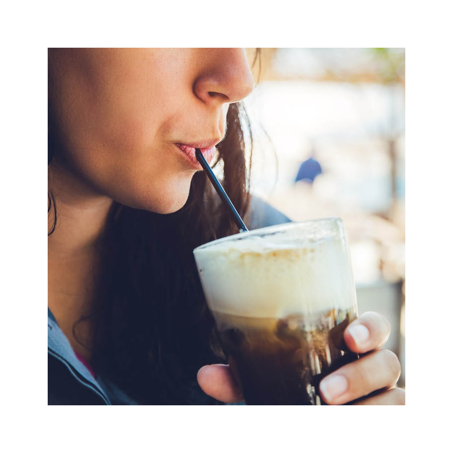 Franke Coffee Systems woman having iced coffee