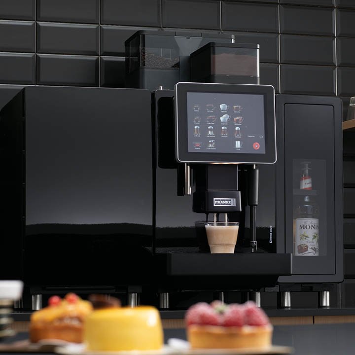 Franke Coffee Systems, fully automatic coffee machine Franke A800 with black background, café and deserts, bakery environment