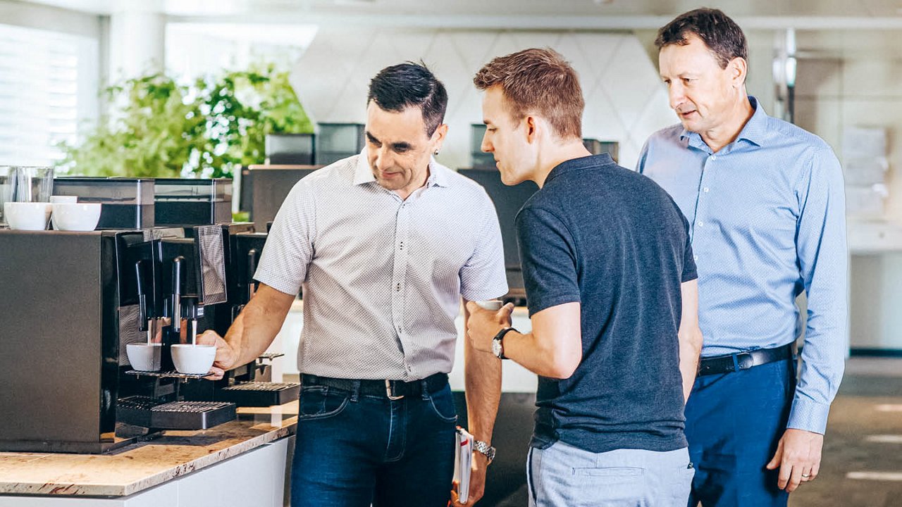 Franke Coffee Systems, Aarburg, Showroom, three man by coffee machine, A300 machine