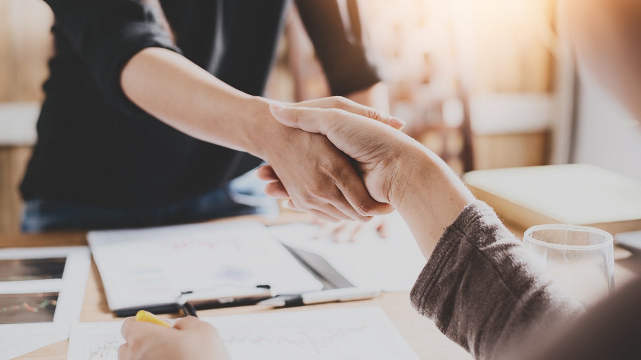 Two people shaking hands