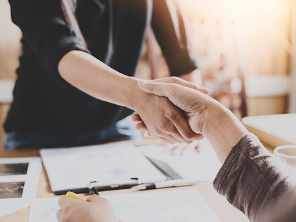 Two people shaking hands