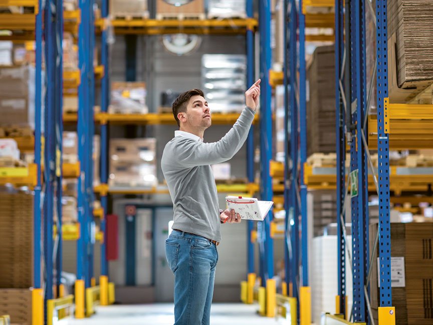 person standing in a warehouse