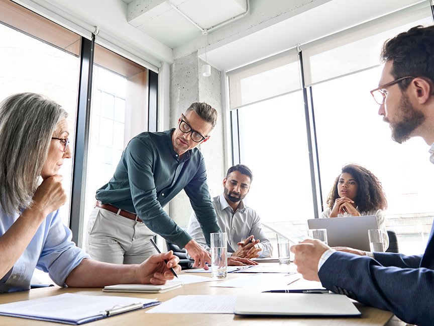 a group of employees at a table