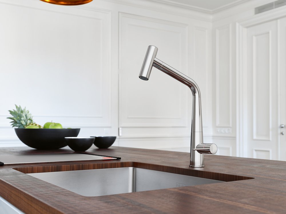 Icon Faucet paired with a peak stainless steel sin a contemporary kitchen