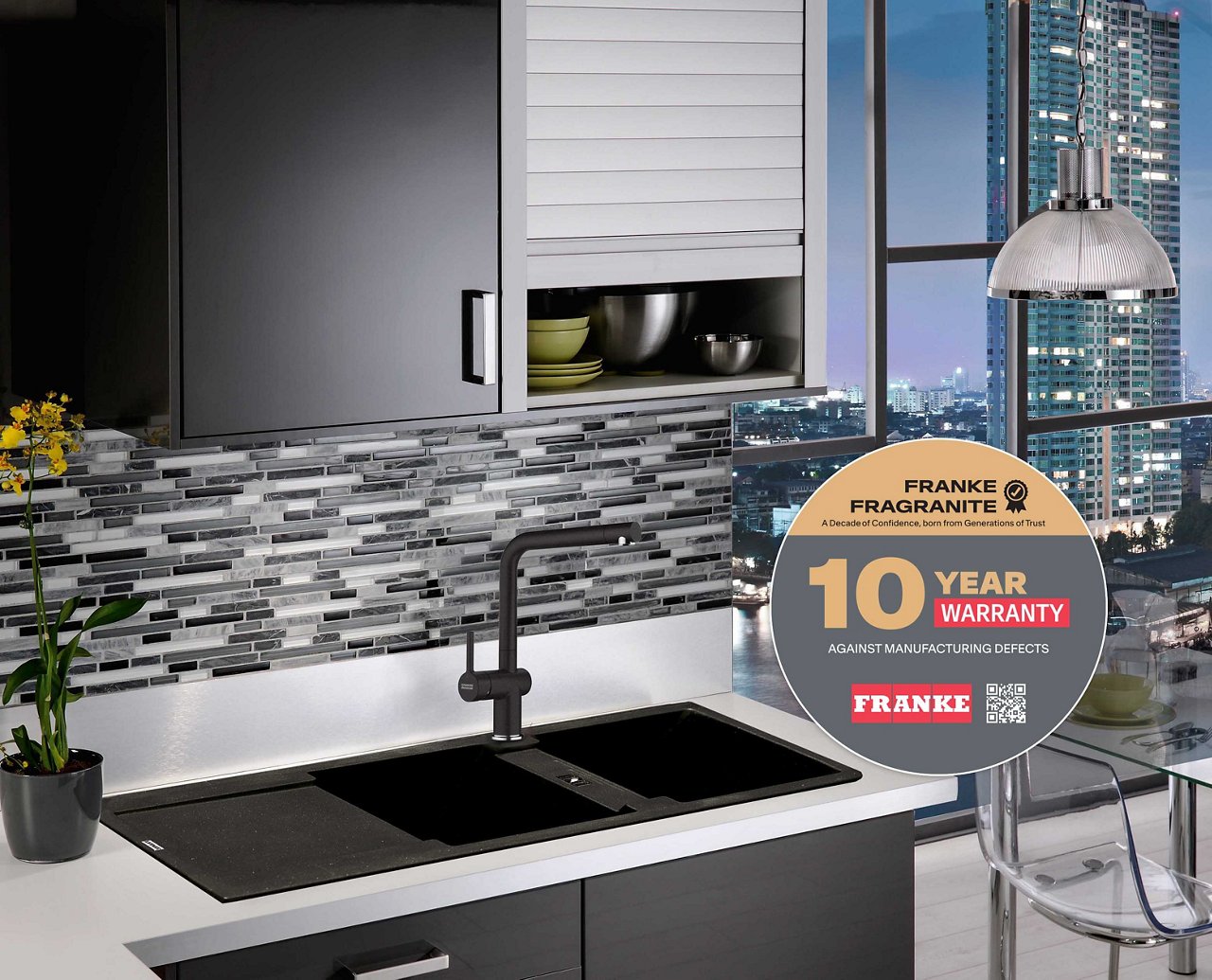 Raised view of kitchen sink with many sink accessories on a kitchen island
