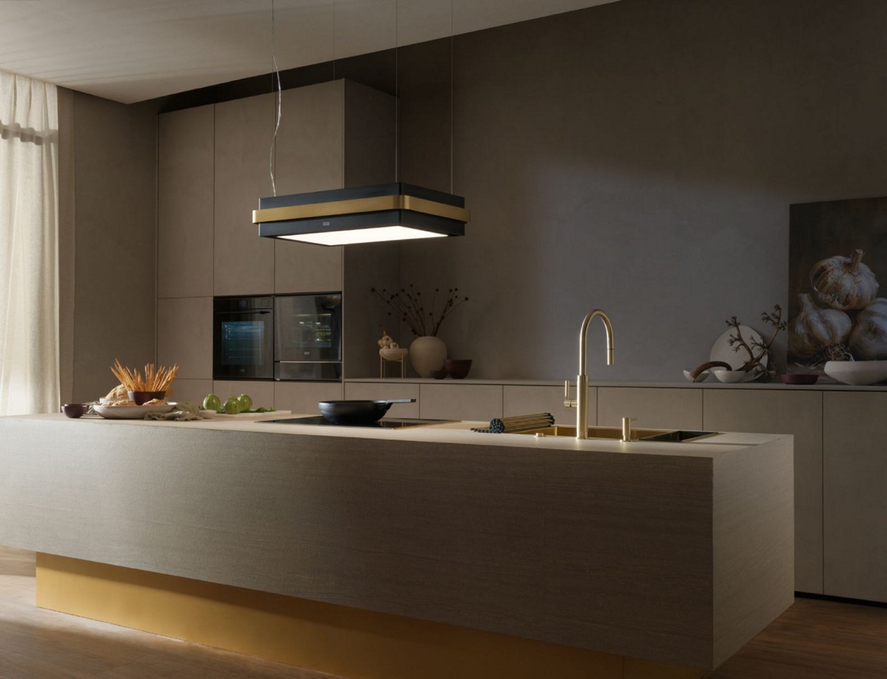 Bright island kitchen with gold metallic finishes