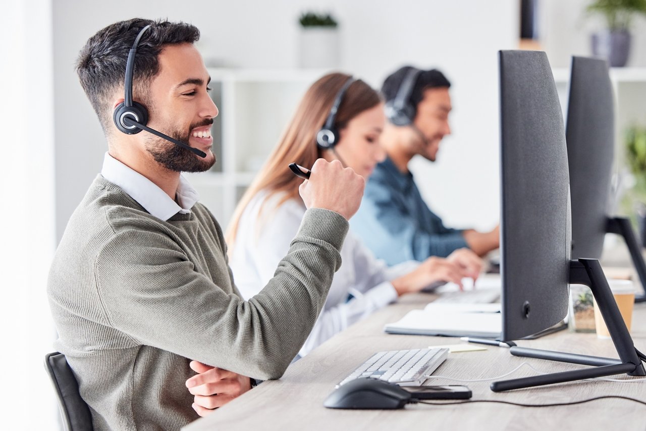 Franke employees with headsets