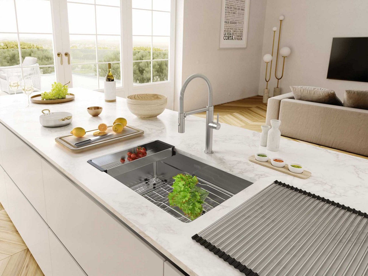 Vegetables being prepped over a Franke Pescara single bowl stainless steel kitchen sink set in a large kitchen island