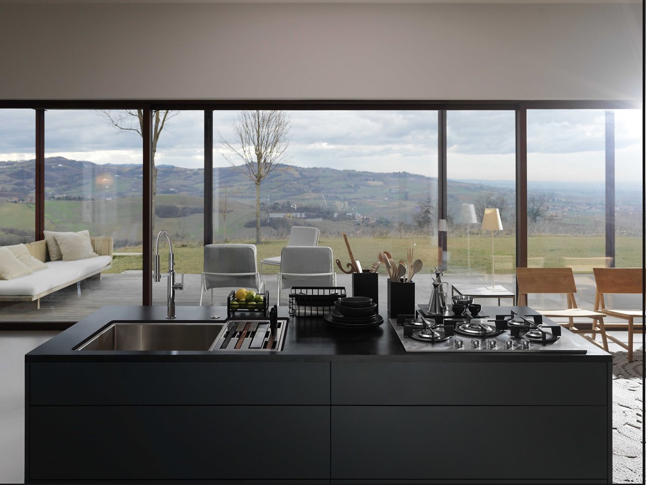 Kitchen sink workstation with stainless steel faucet