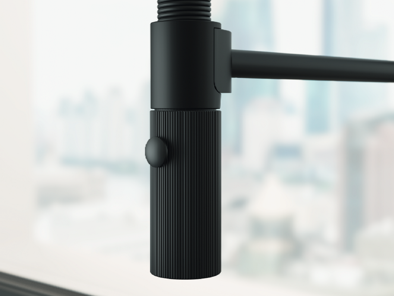 Black matt Maris Stripes tap with copper details and finishes showing details of spray head