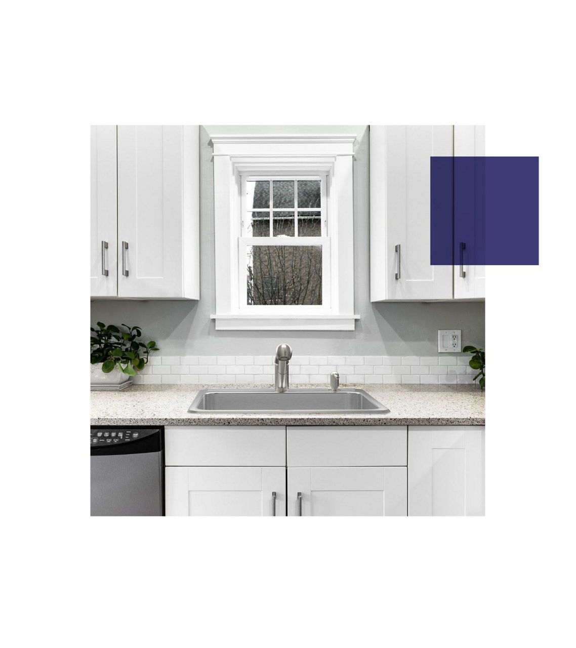 Single bowl top mount kitchen sink in front of a window in a bright white kitchen