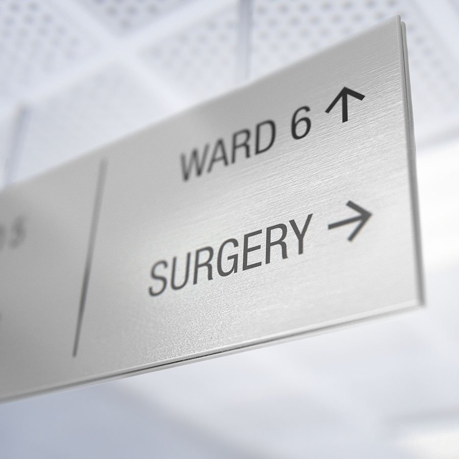 Overhead directional sign in a hospital