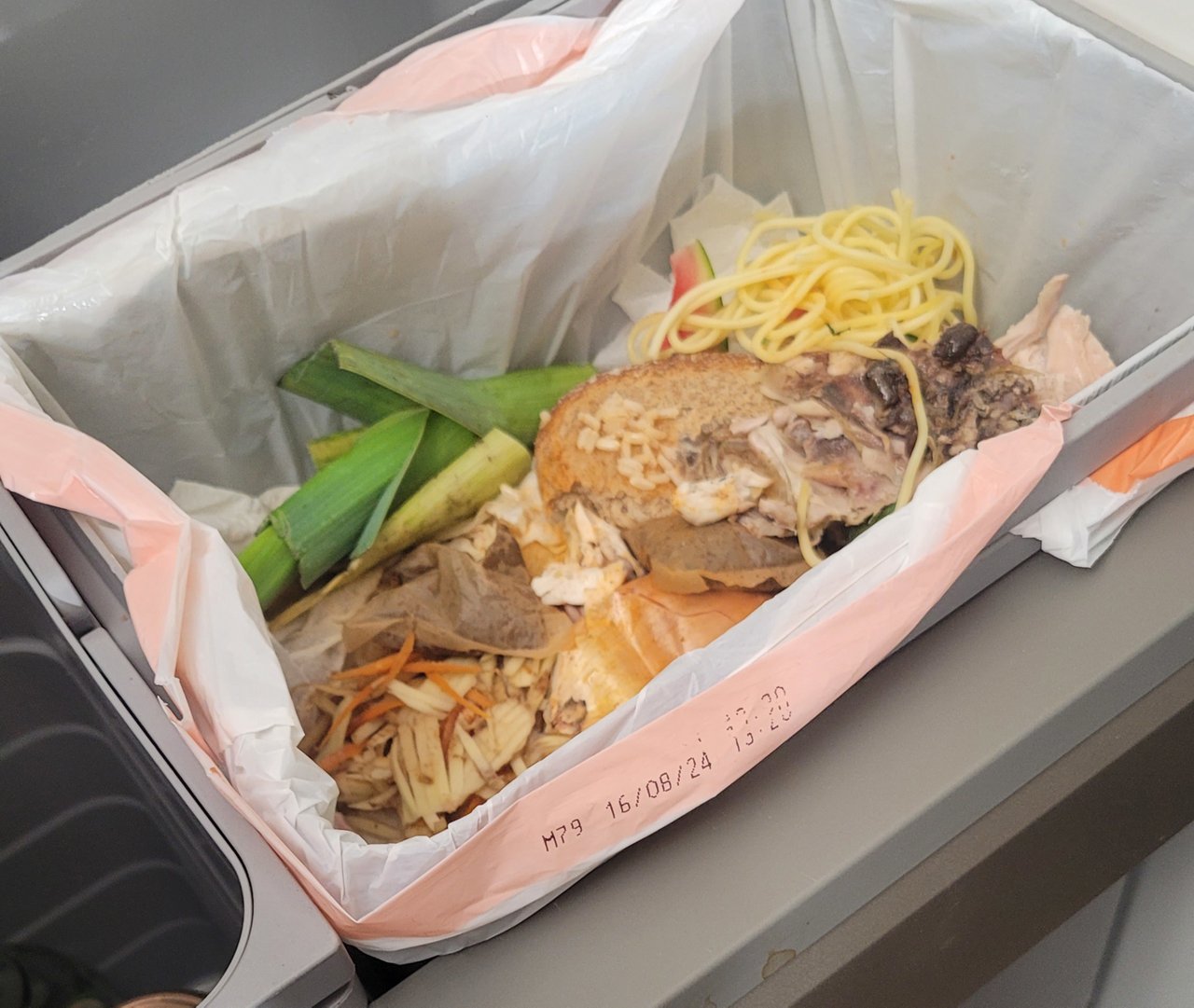 Food waste in a kitchen bin
