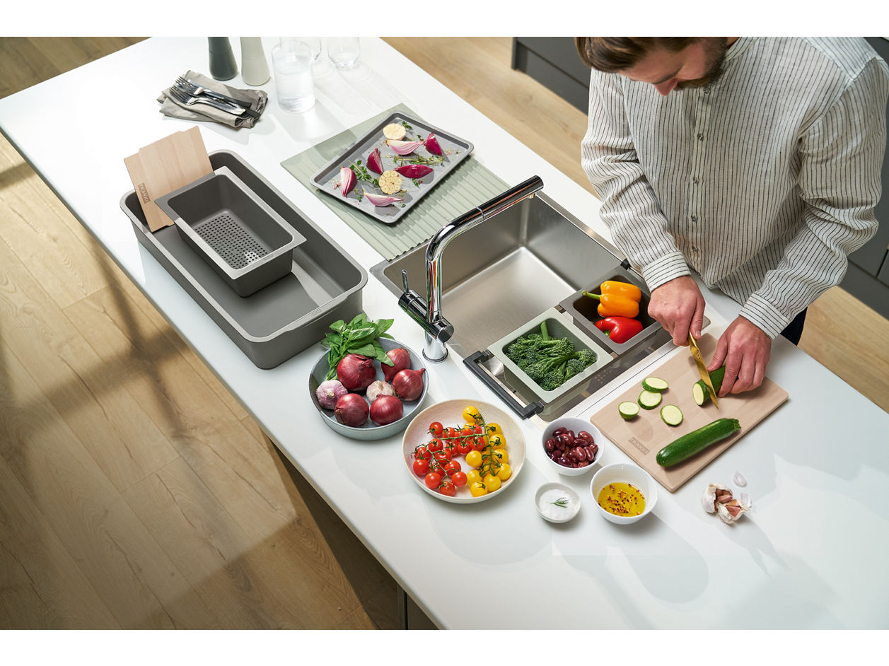 Franke All In Universal Sink Accessory Kit over a stainless steel