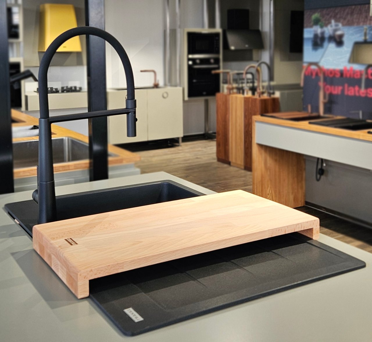 A Franke sink, tap and chopping board