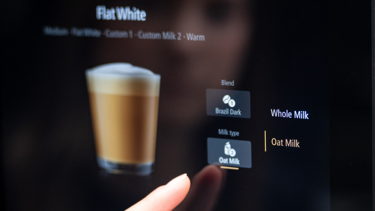 Franke Coffee Systems, coffee machine screen interface, menu, close-up customer ordering flat white, milk choice