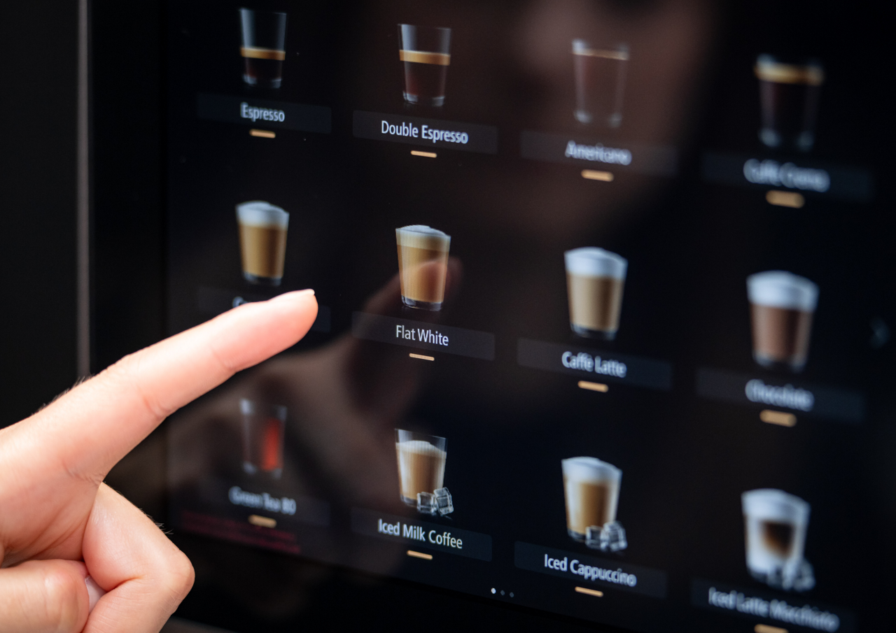 Franke Coffee Systems, coffee machine screen interface, menu, close-up customer ordering flat white