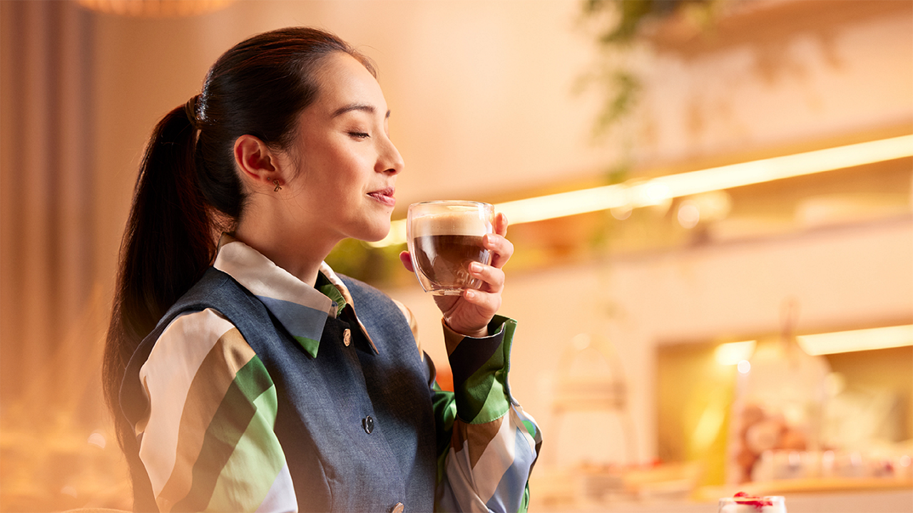 Franke Coffee Systems, woman drinking cappuccino