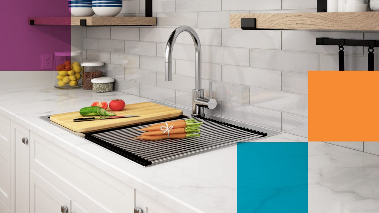 bright modern kitchen featuring a kitchen sink workstation with stainless steel faucet