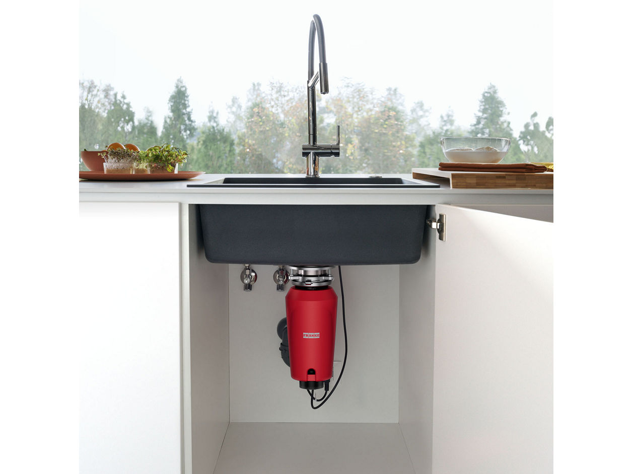 undercounter shot of waste disposer
